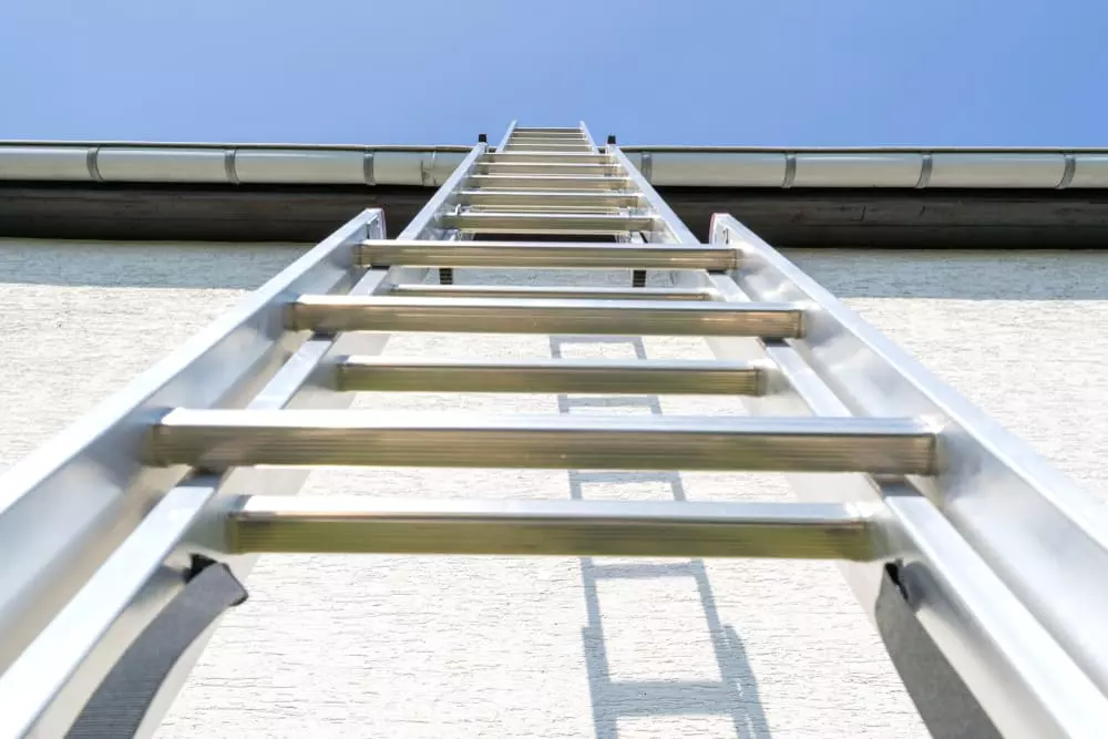 ladder leaning against house